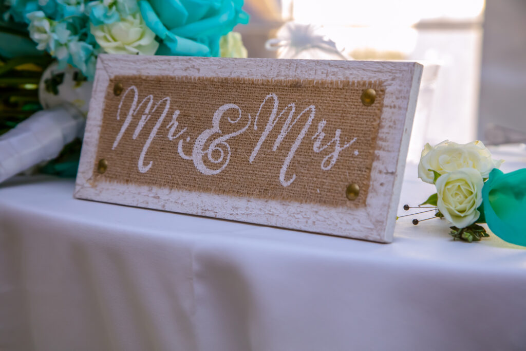 Mr and Mrs sign on wedding reception table