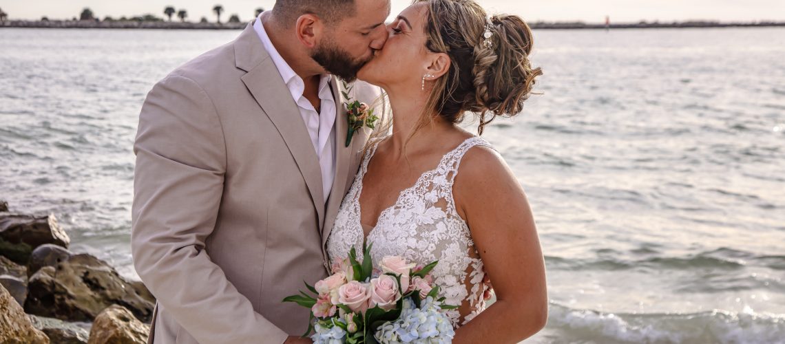 bride and groom on the beach